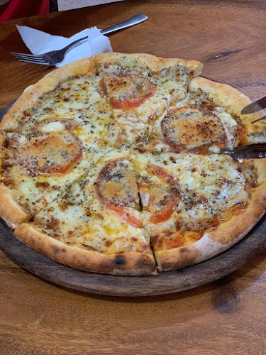 Pizzeria D'Lily “Pizzas en Leña Artesanal”