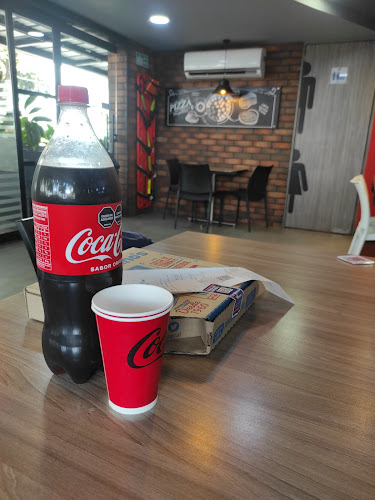 Domino's pizza Conucos - Gastronomía y hostelería