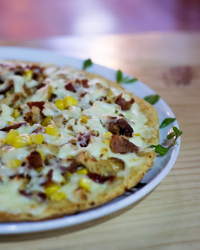 Opinii despre La Migliore Pizza în Palmira - Gastronomía y hostelería