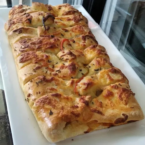 Panadería y Repostería Amigos de Iriel - Gastronomía y hostelería