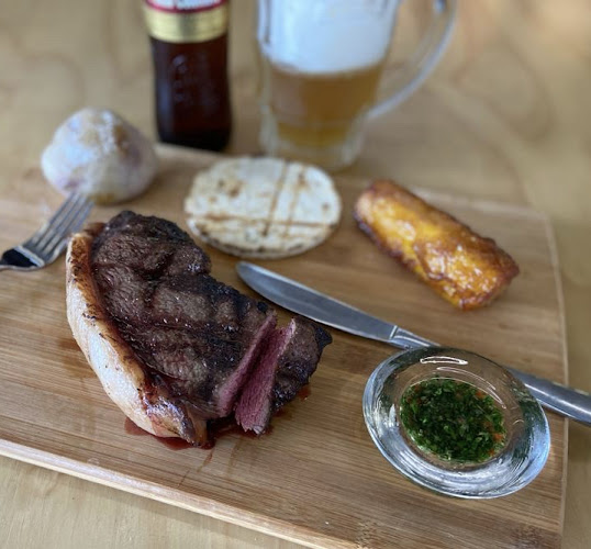 Opinii despre Troncos y Carbón - Parrillada y maiscos - Restaurante Pereira - Carnes al carbón - Bolivar Plaza în Pereira - Gastronomía y hostelería