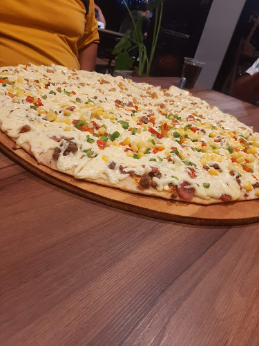 Mega Pizza - Gastronomía y hostelería