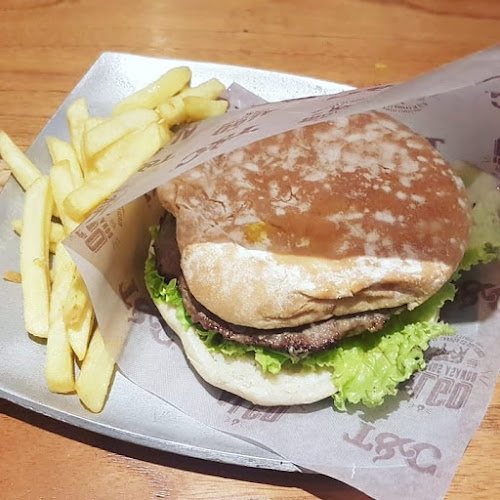 Troncos y Carbón - Parrillada y maiscos - Restaurante Pereira - Carnes al carbón - Bolivar Plaza - Pereira